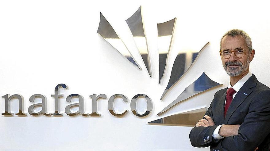 Retrato de Juan Luis Sagaseta de Ilurdoz, nuevo presidente de Unnefar, posando con traje y corbata junto al logotipo corporativo.